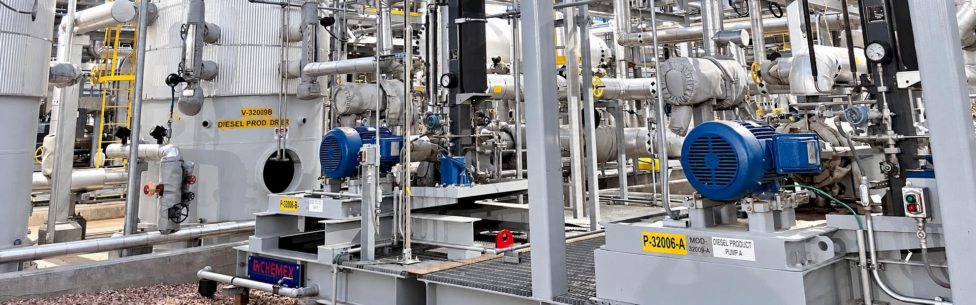 Chemex diesel-processing equipment with blue pump motors, insulated vessels, valves and stainless-steel pipework.